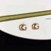 スタッドラグジュアリーゴールドイヤリングデザイナー女性のための小さなスタッドイヤリングは、銀の豪華なクラシックな耐久性のある真鍮です