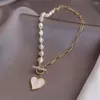 Pendentif Colliers 2023 Mode Tendance Lumière De Luxe Perle Creuse Chaîne Fermoir Collier Coeur Femmes Fête Cadeau Bijoux Tempérament