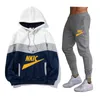 New Chegada Men's Autumn Winter Tracksuits Capuz e calça 2 peças