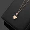 2023 Classic brand T Crystal Pendant for women's new product charm peach heart diamond necklace 18k gold titanium steel designer necklace jewelry