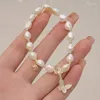 Braccialetti con ciondoli Bracciale con perle naturali Studentessa Amica Edizione coreana Manipolo bianco Beibei Butterfly Insider Design
