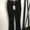 Skriv ut denim Bell Bottoms Women Street Style High midja Fold Denim Pants Black Jeans Designer Trousers