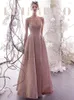Sukienki imprezowe Prom Long 2023 Suosikki Eleganckie złotoce