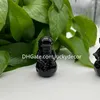 Hand snidad naturlig svart obsidian astronaut figurkonst lycka kvarts kristall sten spaceman skalle skulptur mineral prov självstående prydnad