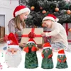 Świąteczne zabawki zaopatrzenia elektryczne Święty Mikołaj Głowa Prezenty świąteczne dla dzieci Święta Święta Mikołaj Claus zabawka może śpiewać i rozmawiać na świątecznych dekoracjach stolik w domu 231124
