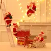 Suprimentos de brinquedos de Natal Enfeites de Natal Presente Escada de escalada elétrica Papai Noel Boneca Brinquedos com Música Feliz Natal Árvore Pendurada Decoração 231124