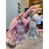 Keychains mignon diamant pavillon ours ours clés de trèfle couple couple de fille décoration petite voiture pendante clés anneau étudiant sac llavero gifkekkains