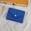 23SS Womens korta plånböcker Luxurys Designers Liten lättnad av Cowhide Handbag Bag Victorine Ladies Travel Wallet Coin Purse With Box