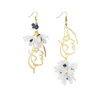 Dangle Earrings Design Sense Fashion Jewelry非対称の美しさの花の花女性日本語と韓国の気質タッセルイヤリング。