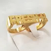 Bröllopsringar Kristenco Anpassade namnringar Guld Personlighet Hip Hop Ring One/Two/Three Finger Men Fashion Punk Letter Ring Gifts 231124