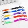 Nyckelring med klippfjäderspolningsladdning Tether Flexibel stöldfast stretch Elastic Lanyard Keyring Fashion Key Chain Key Ring Random Color ZZ