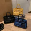 Birkinbag 2023 Sac de capacité de créateur de gros sac à main Nouvelle mode de toile de voyage portable de la mode Fashion Portable Sac