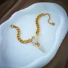 Braccialetti di lusso con collana a testa di serpente, catena a maglia cubana in acciaio al titanio placcato oro 18 carati, design alla moda con ciondolo animale Bling ghiacciato, gioielli girocollo hip-hop