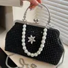 Bolsas de noche 2024 Mujeres de lujo Glitter Diamond Clip Shell Pearl Bolso Clutch Diseñador Lady Cadena Hombro Messenger 231123