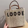 Femmes Designer Sacs fourre-tout en paille pour hommes Casual Bureau Embrayage Bourse Designers Raphia Tissé Sac Bandoulière Sacs À Main De Luxe Lettre Lo Totes