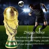 アートアンドクラフトヨーロッパゴールデンレジンフットボールトロフィーギフトワールドサッカートロフィーマスコットホームオフィスの装飾