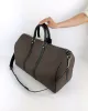 Designer axelkoppling äkta läder keepall mode m41424 duffel väskor lyxiga kvinnors män bagage crossbody stor rese hand väska berömda topphandtag stamväskor