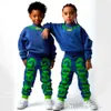 2023 Fall Kids Designer Clothes Boys Girls Tracksuit 2023 New Leisure Sports Tvåverk Set Klädbrev Solid tröja Långärmhuvtröjor och byxor 2st.