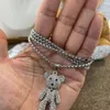 Collana lunga alla moda con orsetto di coniglio con diamanti d'acqua