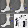 Крюк носки мужские и женские черно -белые полотенце с утолщенными в четыре сезона спортивные носки баскетбол для бега