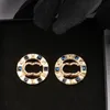 Splate 925 Srebrna luksusowa marka projektantów liter Stud Geometryczne słynne kobiety okrągłe kryształowy krysztonowy kolczyk wesel