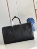 2023 Designers mode sacs polochons luxe hommes femmes sacs de voyage sacs à main en cuir grande capacité fourre-tout bagage à main nuit week-end sac avec serrure