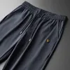 Mensu -trajes pretos de verão preto azul escuro fino e rápido traje de pólo casual elástico calças soltas moda 2 peças conjunto 230424