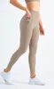 Pantalon actif Leggings de sport Sexy Gym Yoga Fitness Mode Couleur unie Double poches latérales Anti-Rolling Nude Pied sans couture