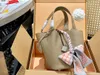 2023 Designer Tote Bag Y2K Women's Lock Casual Totes Fashion Luxury Smile Handväskor Design för kvinnor axelväskor läder shopping väska vår sommar söt handväska