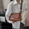 Omuz çantaları vintage crossbody çantalar için pu deri yeni 2023 yaz trend moda tasarımcısı küçük düz renkli omuz yan çanta