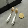 Boucles d'oreilles à clous, vente directe, mode polyvalente, prise de vue de rue, féminité, réseau japonais et sud-coréen, clip d'oreille rouge Dk22