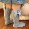 Детские носки Гольфы для девочек с бантиками Дышащие мягкие детские хлопчатобумажные носки Полые длинные носки для новорожденных 0-3 лет R231125