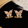 Kolczyki obręczne miedziane 18-karatowe złoto wysokiej jakości sens inkrustowany motyl z cyrkoniem unikalna spersonalizowana biżuteria temperamentowa