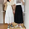 Kjolar vår sommar kvinnor chiffong vintage hög midja elastisk lapptäcke vit svart chic lång kakan aline kjol för student 230424