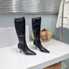 Luksusowy designerski designerski stolotek sztylet sztylet sznurka rzędu Kobiety Spike Elastic Boots moda wysokiej jakości buty do kolan rozmiar 35-40