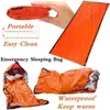 Рюкзак упаковывает водонепроницаемые тепловые аварийные спальные мешки для выживания.
