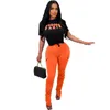 Partihandel Womens Designer Track Suit Casual Two Piece Set Pleated Split Pants Letter Tryckt Fashion Kort ärmfickor Truenter GRATIS frakt