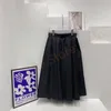 Fashion Suits Vielseitiges Kleid für Frauen Half Body Rock Hose mit Metall-Logo Schwarz SML und Damen-Oberteil mit Reißverschlussriemen Schwarz Khaki SML