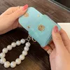 Cute Mini Soft Imitate Pearl Coin Purse Key Ring Small Earphone Box Soft Leather Key Organizer Bag Key Ring Wallet Pouch