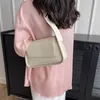 Bolsos de hombro bolsos cruzados vintage para mujeres PU cuero PU Nuevo 2023 Tendencia de verano Diseñador de moda Pequeño color de hombro sólido