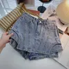 Shorts pour femmes été femmes bleu noir Shorts mode taille haute épissé couleur unie irrégulière A-ligne jambe large Denim Shorts femme 230425