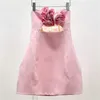Robes décontractées Été 2023 dans la robe à épaules dénudées pour femmes décoration de fleur de mode coréenne rose backless mini-jupe fête