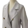 Cappotto da donna in misto lana di fascia alta da donna di media lunghezza in cashmere Autunno Inverno Acqua ondulata grigio cammello color caramello cintura con bottoni cucita a mano 231124