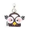 Créativité hibou porte-monnaie porte-clés pendentif charme bijoux porte-clés en cuir PU fleur grille concepteur en métal porte-clés