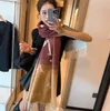 2023Nieuwe kasjmier sjaal Pashmina hoogwaardige winterisolatietas van een luxe merk voor damesontwerpers en neutrale casual modieuze sjaalhoodie