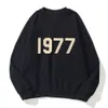 Sweatsirts Fasion para hombre Chándales Ess Letter 1977 Essentialoodies Jersey Hombres Mujeres Ropa deportiva con capucha Calle Sudadera suelta Chaqueta con capucha deportiva 1xm0