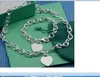 2023 belle mignonne pendentif colliers épaisse chaîne en acier inoxydable coeur unique concepteur de luxe femmes collier bracelet costume avec sac à poussière et boîte