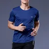 Outdoor Tshirts Wysokiej jakości poliestrowe mężczyźni bieganie t Szybkie suche trening ćwiczeń ćwiczeń Gym Sport Tops Lekkie 230425