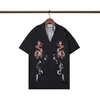 Camisas de diseño de lujo hawaianas de verano Camisa de bolos con estampado geométrico de moda para hombre Camisas casuales florales de Hawaii Hombres Slim Fit Variedad de manga corta