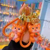 Keychains Creative Kawaii Cute Pet Keychain Lovely Orange Resin Doll Keyring Fashion Lady Handtas Hangscherm Key Chain Women Gifts